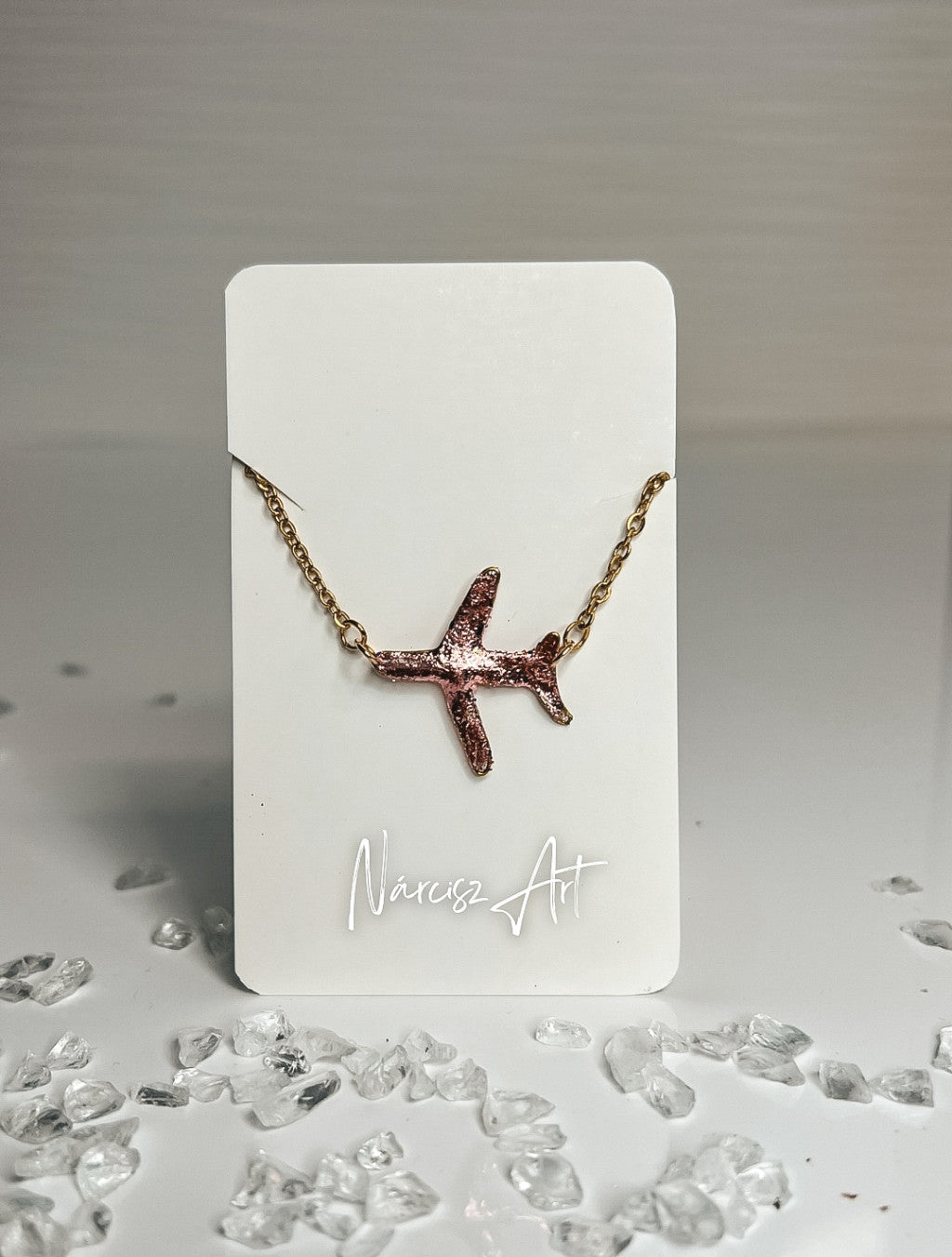 Repülő formájú epoxi gyanta karkötő, több színben